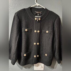 ST JOHN black zip-up sweater jacket with pearl buttons.